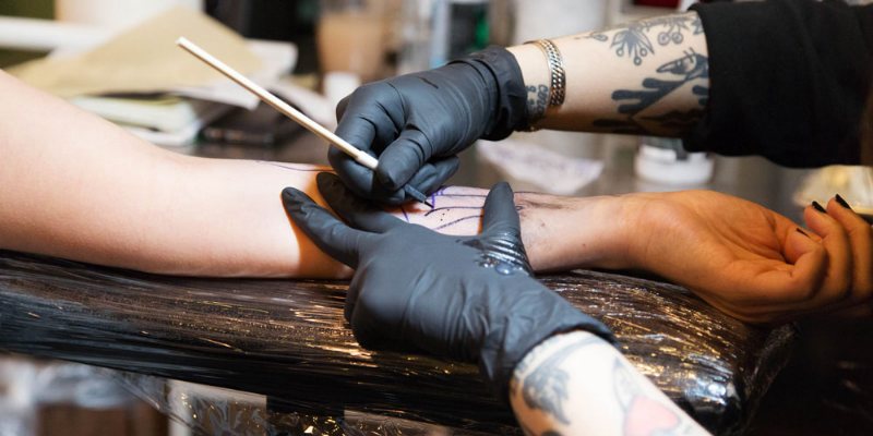 Hand poke tattooing is done with a needle and ink, without electricity.